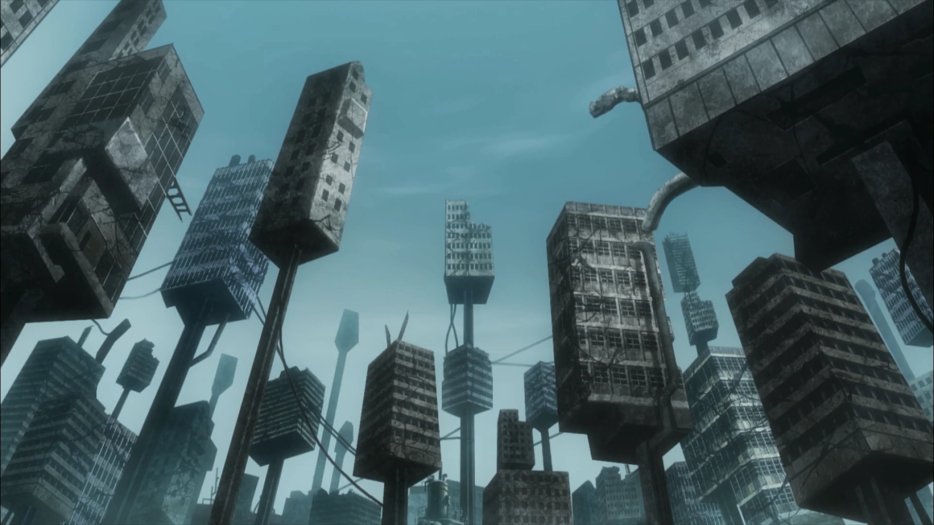 Background image of setting. Several narrow, rectangular buildings standing on stilts.