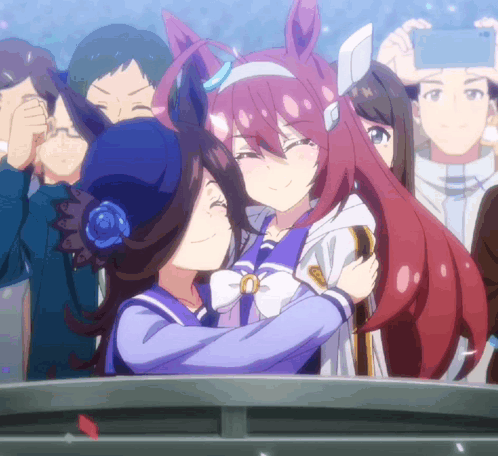 Gif of Rice Shower hugging Mihono Bourbon behind a barrier.