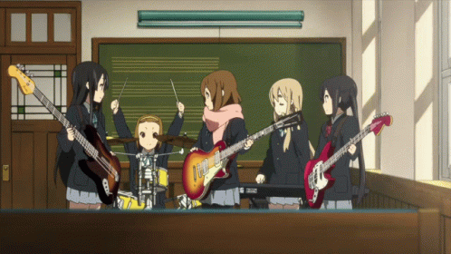 gif of scene from K-On, where girls in band celebrate after practicing
